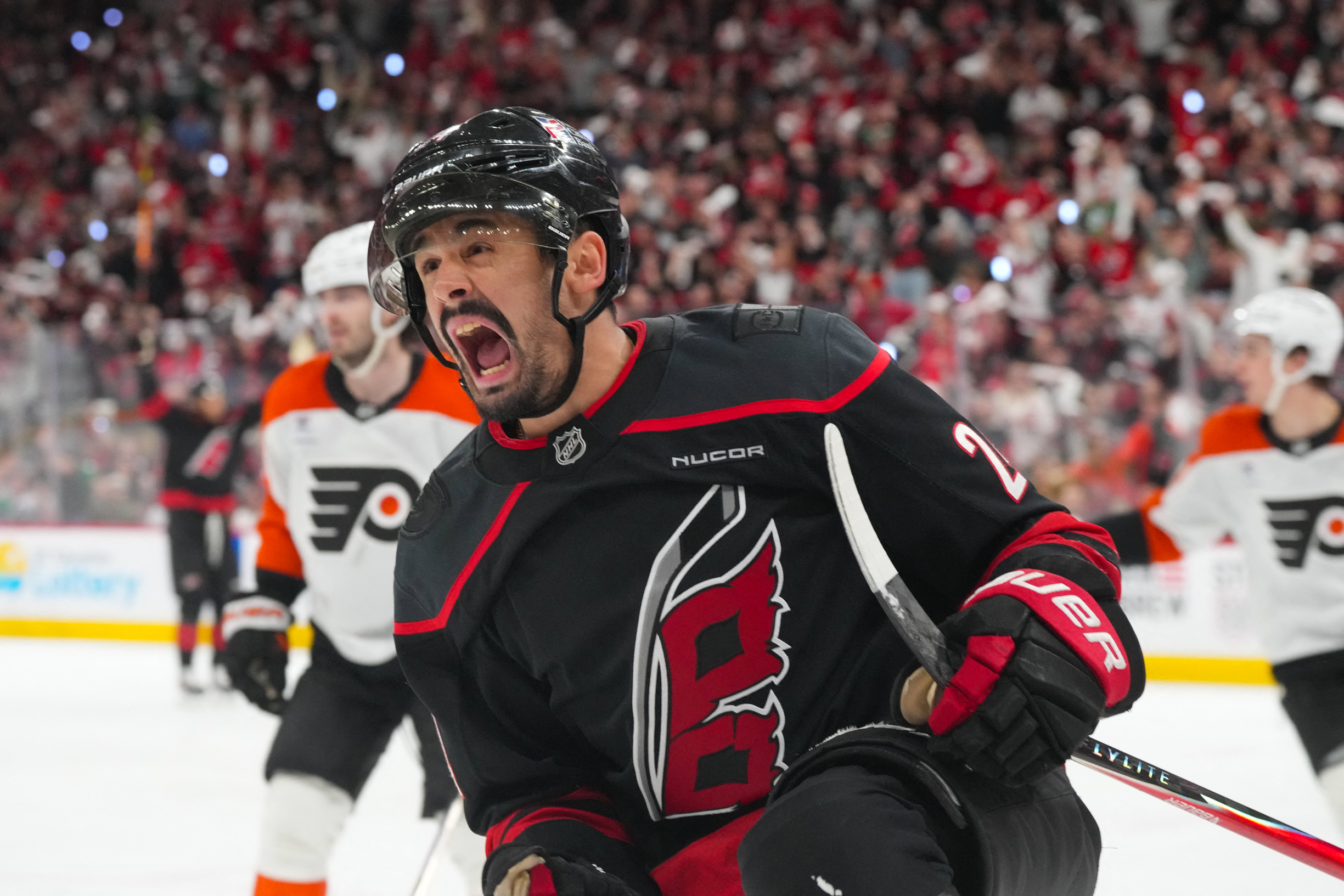 Carolina Hurricanes center Seth Jarvis (24) scores a goal against the Philadelphia Flyers during the third period in game two of the second round of the 2026 Stanley Cup Playoffs at Lenovo Center.